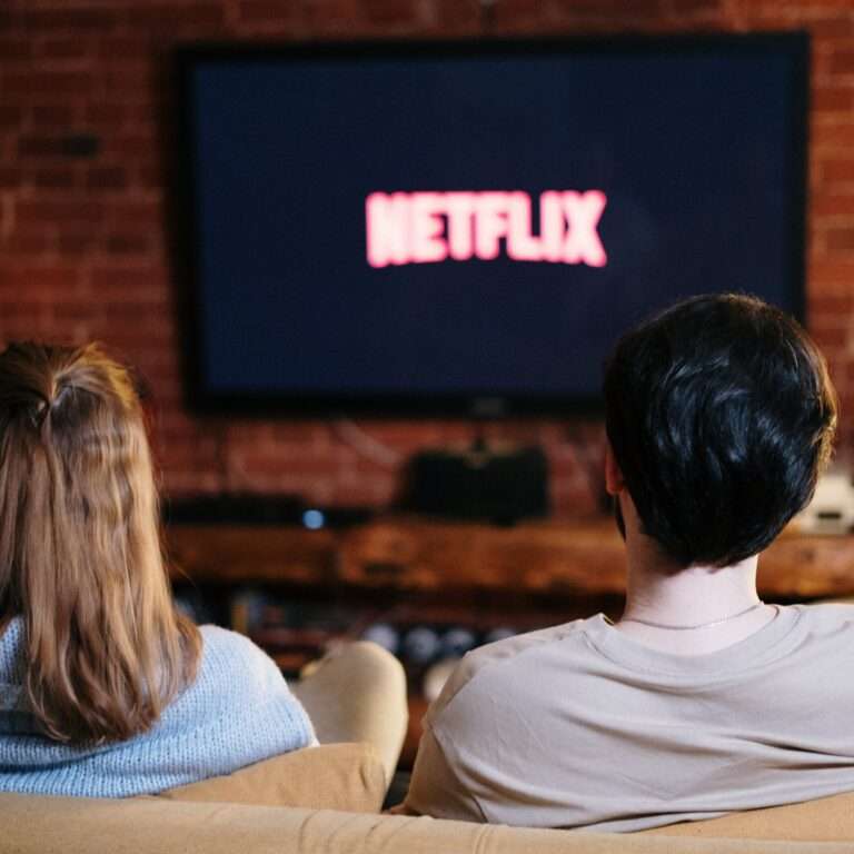 A couple watching a TV repaired in Houston, Texas